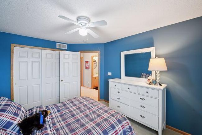 Bedroom 2 features a double closet. | Image 28