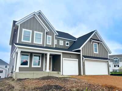 Ready Now! Our popular, thoughtfully designed Victoria Plan is a stunner! This home features 4BR up with a 5th BR and 3/4 BA in the walk-out lower level! Don't miss it! | Image 1