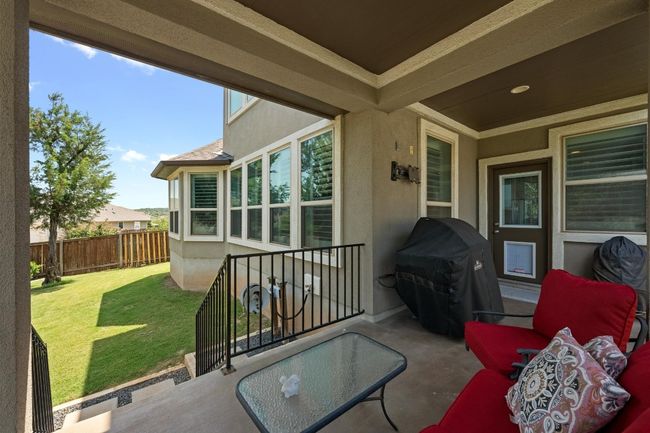 View of patio featuring a grill | Image 34