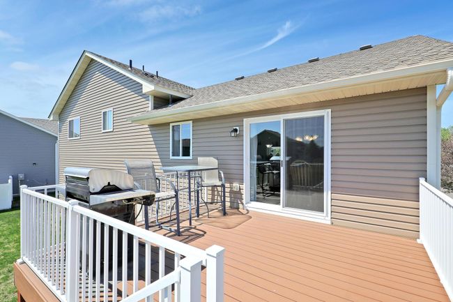 Step outside to a beautiful, maintenance-free deck-perfect for enjoying the outdoors, hosting barbecues, or relaxing in your backyard. | Image 34
