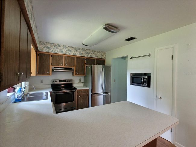 13385 Ne 10 Th Ct, House other with 3 bedrooms, 2 bathrooms and null parking in CITRA FL | Image 18
