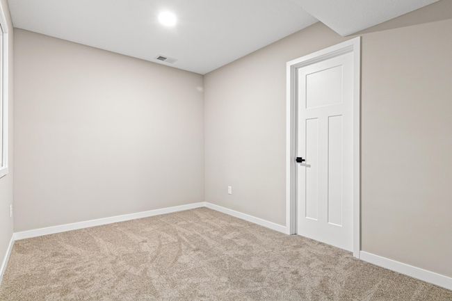 Lower level flex room off the family room - a perfect space for a home office, gym or playroom | Image 16