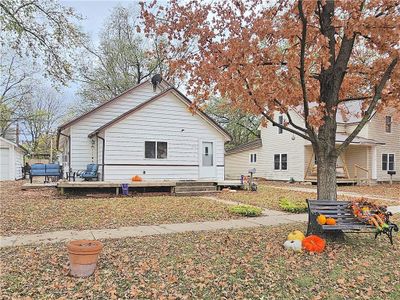 Front view of property featuring a deck | Image 1