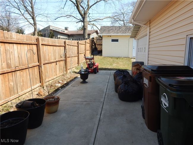 Privacy Fenced Side Patio is 45 x 10 & leads to back yard. | Image 33