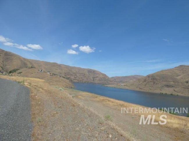 Water view featuring a mountain backdrop | Image 22
