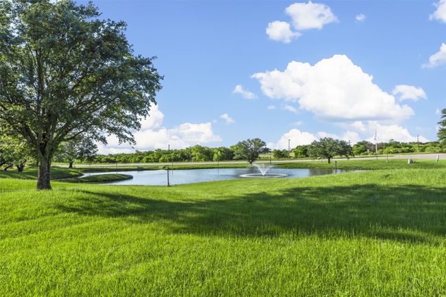 Community pond with fountain as you pull into this secluded neighborhood on west side of Sherman. | Image 38