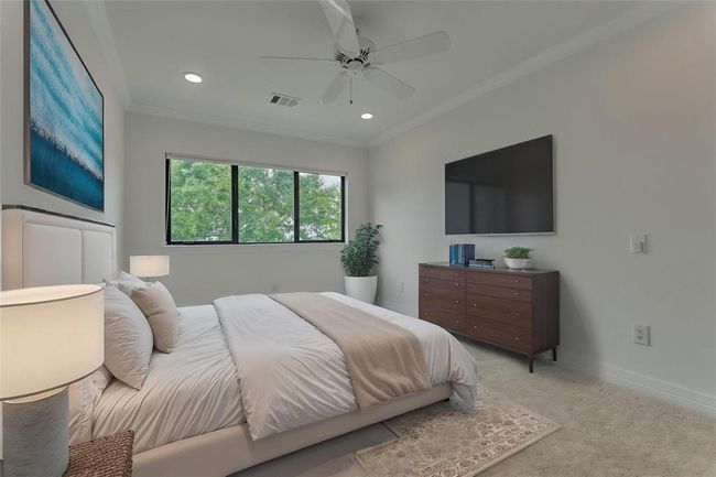 This additional room in the upstairs suite features a large window that fills the space with natural light and offers serene views of the mature trees in the backyard and the sparkling lake beyond. Photo has been virtually staged to show furniture placement. | Image 35