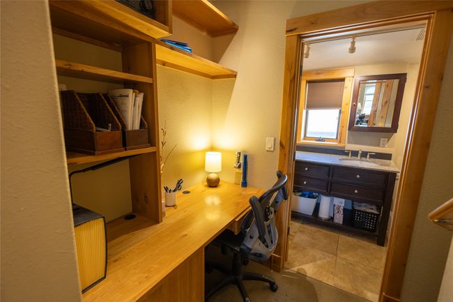 Home office with a sink and track lighting | Image 19