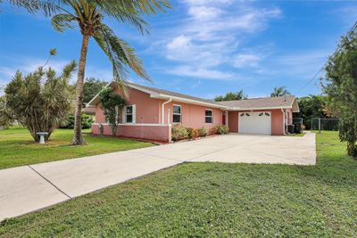 386 Nw Ferris Drive, House other with 3 bedrooms, 2 bathrooms and null parking in Port St. Lucie FL | Image 2