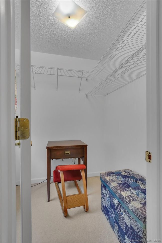 Part of primary en-suite, use as windowed sewing or dressing room (or additional walk-in closet). | Image 17