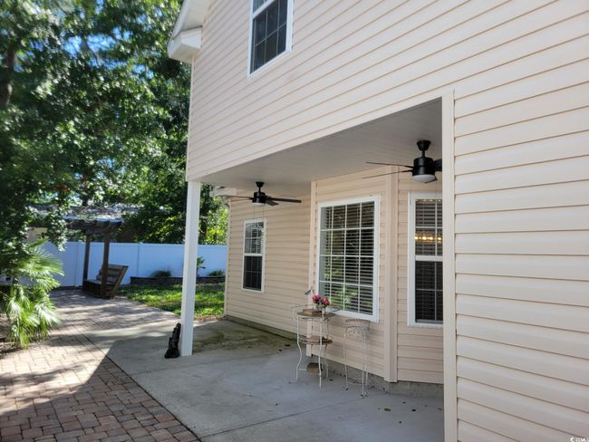 View of patio with ceiling fan | Image 17