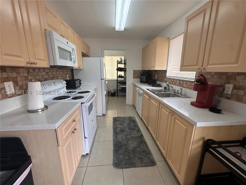 a-404 Nw 2nd Ave, Hallandale Beach, FL, 33009-3326 | Card Image