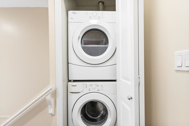 Laundry area with stacked washer / dryer and laundry area | Image 27