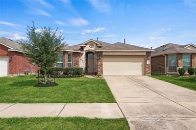 Charming one-story home with a lovely stone/brick elevation. | Image 2