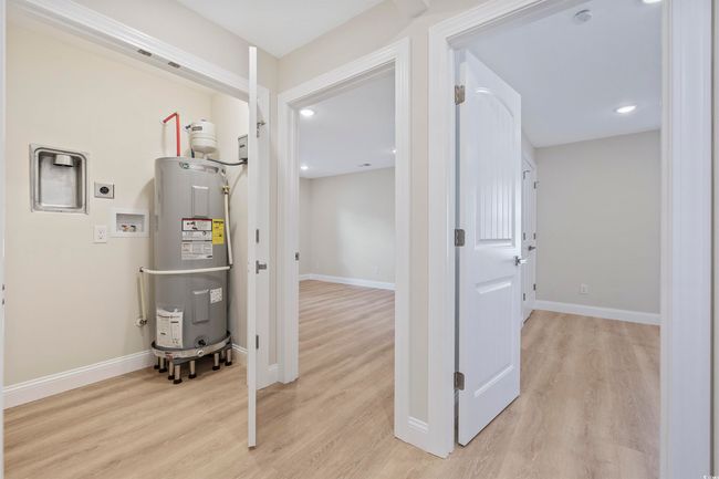 Utility room with water heater | Image 12