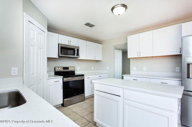 10386 Norvell Rd, House other with 3 bedrooms, 2 bathrooms and null parking in Spring Hill FL | Image 17