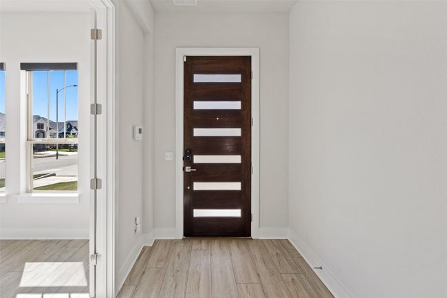 Entrance foyer featuring light wood finished floors | Image 4