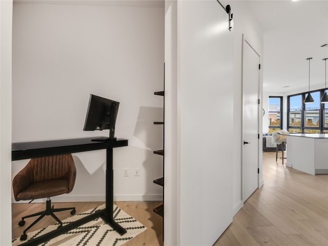 Office featuring light wood-style floors and baseboards | Image 12