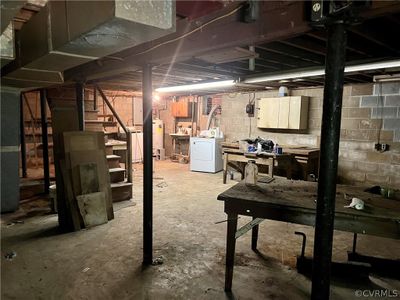 Basement with water heater and washer / clothes dryer | Image 3