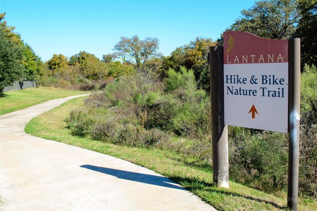Spread throughout the community, the extensive hike and bike trails are the perfect place to relax and stroll around the neighborhood. | Image 38