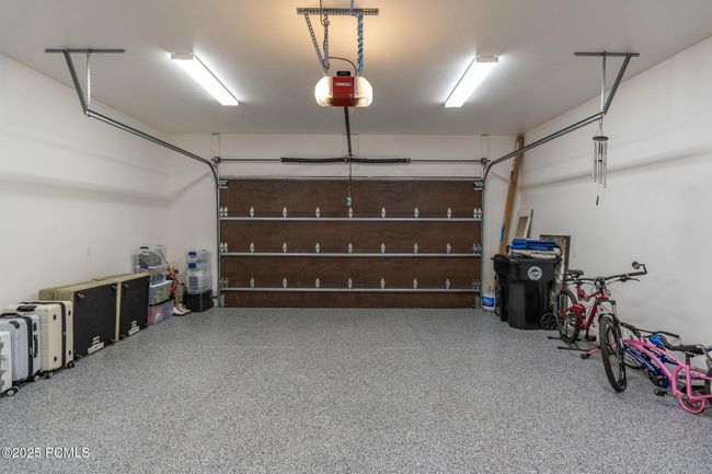 2 car garage with epoxy flooring, hot/cold spigot in garage | Image 32