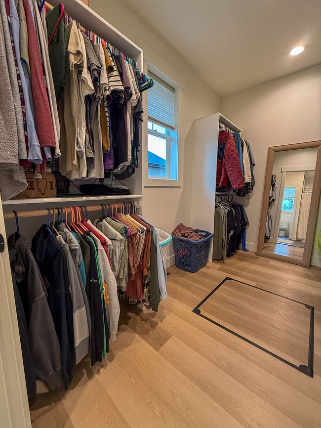 Spacious primary walk-in closet | Image 18