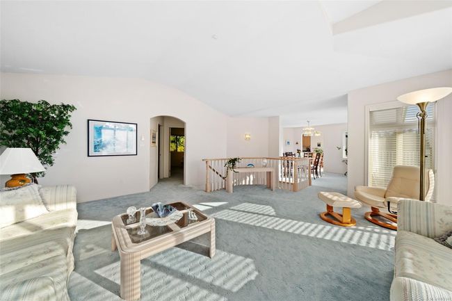 Expansive living areas, fresh neutral tones, and large, bright windows that flood the home with natural light! | Image 16