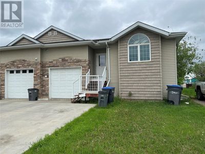 10201 16 St, Home with 6 bedrooms, 2 bathrooms and 3 parking in Dawson Creek BC | Image 1