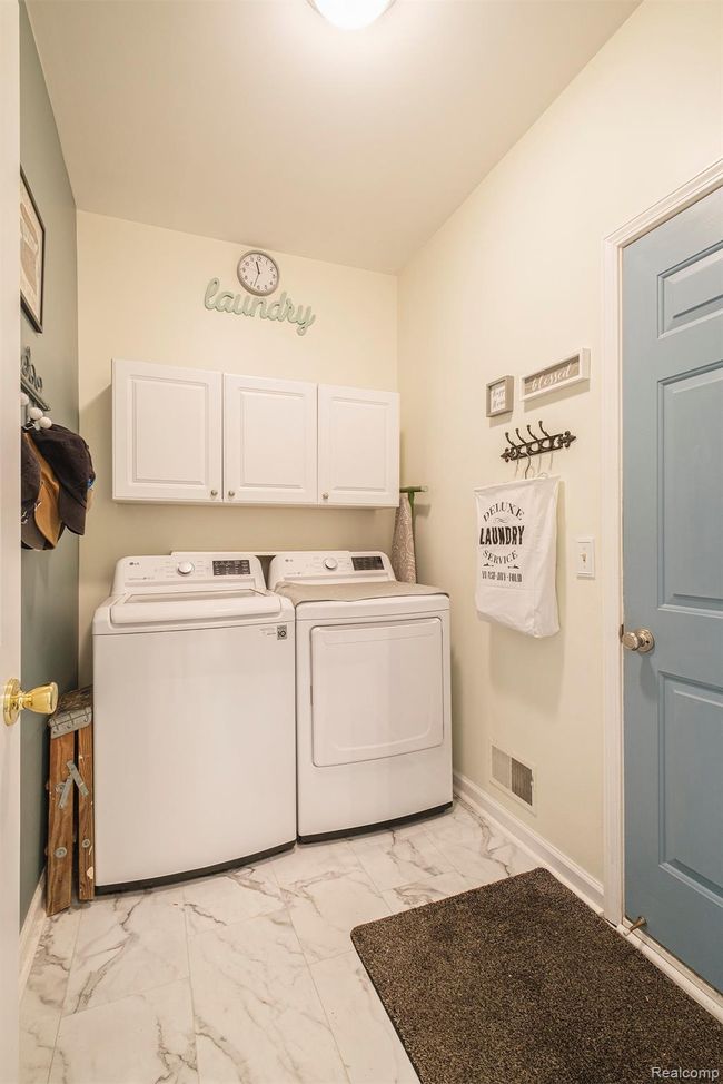 Laundry room on main floor | Image 15