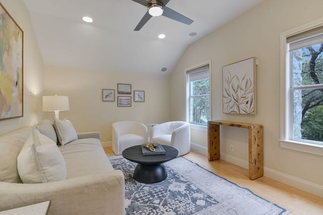 Study located off the primary bedroom is a versatile bonus room—ideal for work, relaxation, or exercise | Image 19