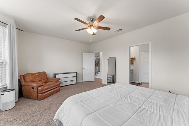 Bedroom featuring carpet and a ceiling fan | Image 15