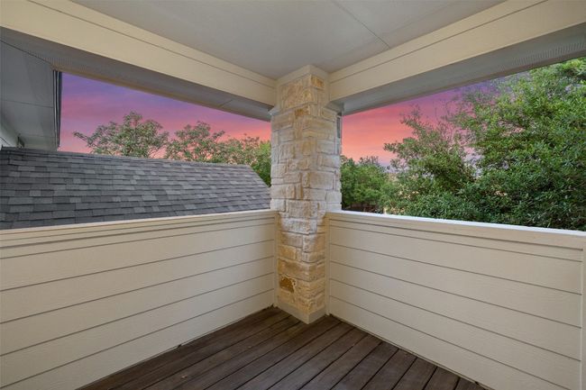 Lofted second living upstairs has a private covered balcony and access to climate controlled server room. Extensive home automation includes lights, doors, shades and security cameras. | Image 18