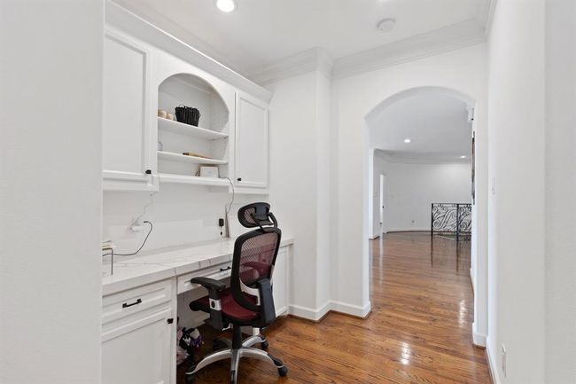 Built-in desk and storage on the second floor, perfect for work, study, or organization. Ample storage keeps everything neat and accessible, making the space both functional and efficient. | Image 35