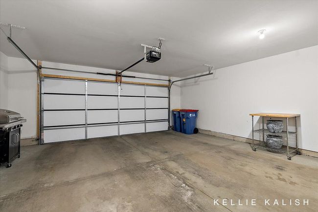 Attached 2-Stall Garage, parking is securely gated, entering from Inverness | Image 30