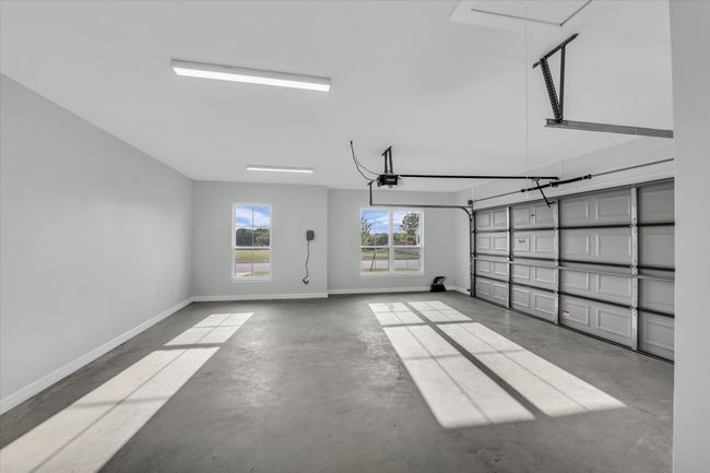 2 car garage has an extra space for storage or a work table | Image 35