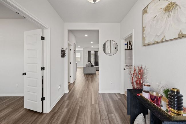 Hallway featuring baseboards, dark wood-style flooring, and recessed lighting | Image 4
