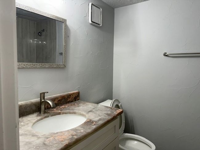 Bathroom with vanity and toilet | Image 15