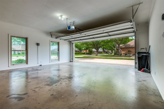 Garage with a garage door opener | Image 28
