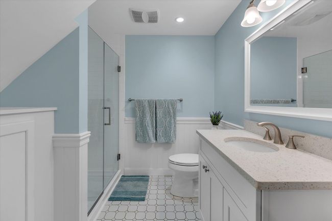 Lower level full bath with wainscoting | Image 14