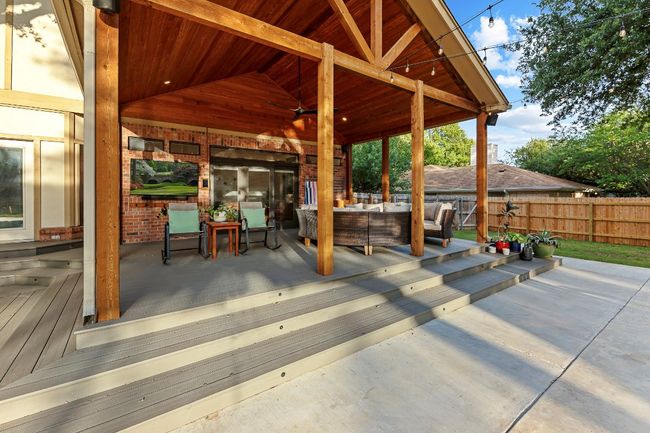 Deck with an outdoor hangout area | Image 32