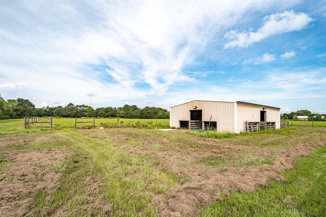 402 Cs Harmon Rd, Home with 4 bedrooms, 4 bathrooms and 2 parking in Hankamer TX | Image 39