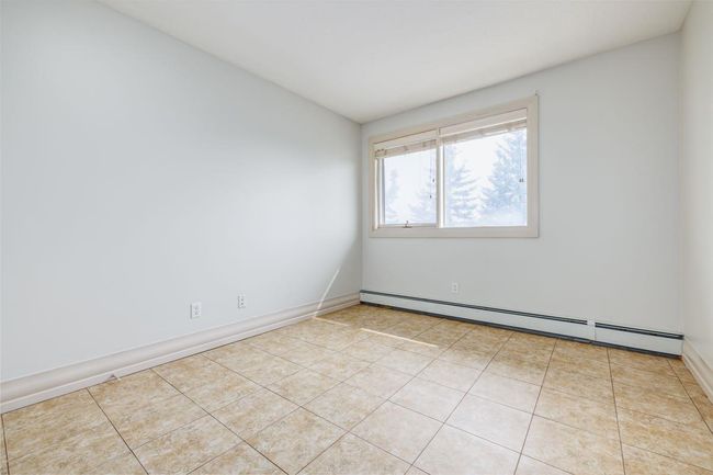 7 - 304 Village Mews Sw, Condo with 2 bedrooms, 2 bathrooms and 1 parking in Calgary AB | Image 12