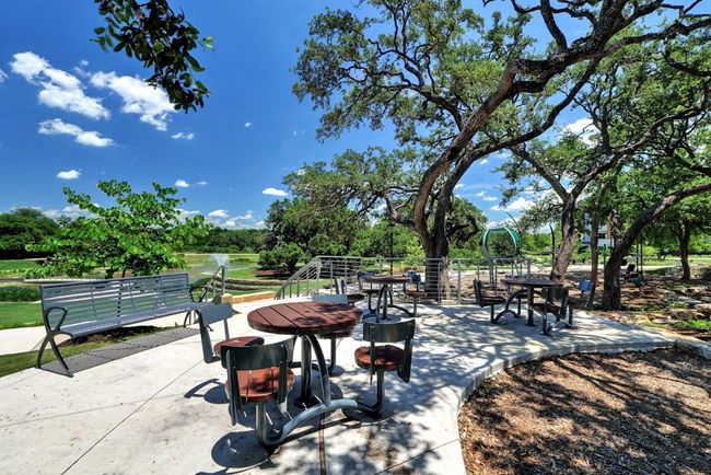 Picnic area overlooking community pond in Signature Park. | Image 35