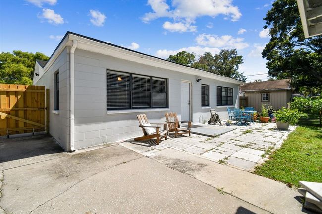 Back of the home and separate entrance to the back unit | Image 11