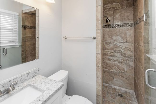 Full bath with vanity and a shower stall | Image 15