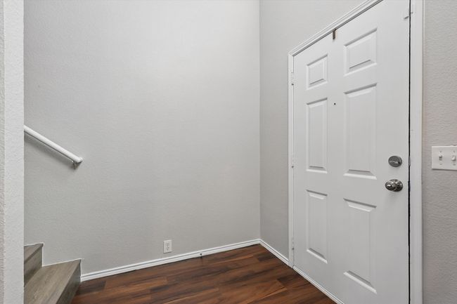 Entryway featuring dark wood-style floors and stairs | Image 23