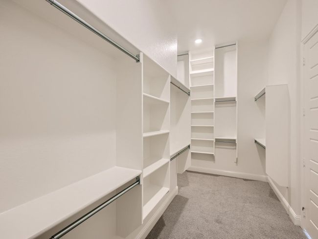 Very spacious primary closet | Image 17