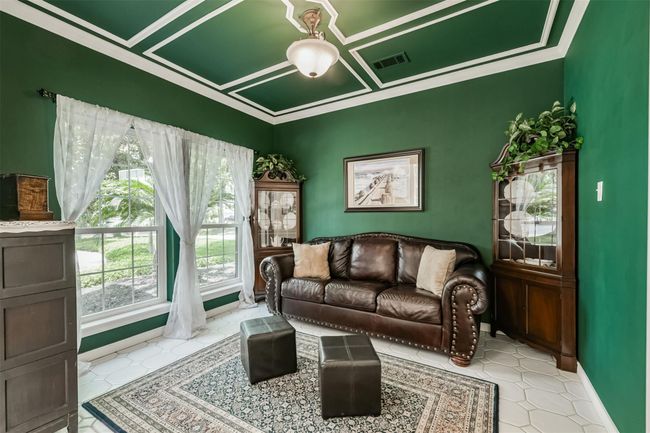 Formal Living Room just to the left of the entry featuring an appealing coffered ceiling | Image 6