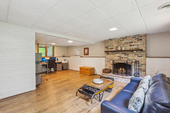 Cozy Family Room with Wood Burning Fireplace | Image 17