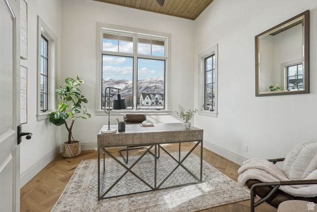 Office area featuring a healthy amount of sunlight and baseboards | Image 19